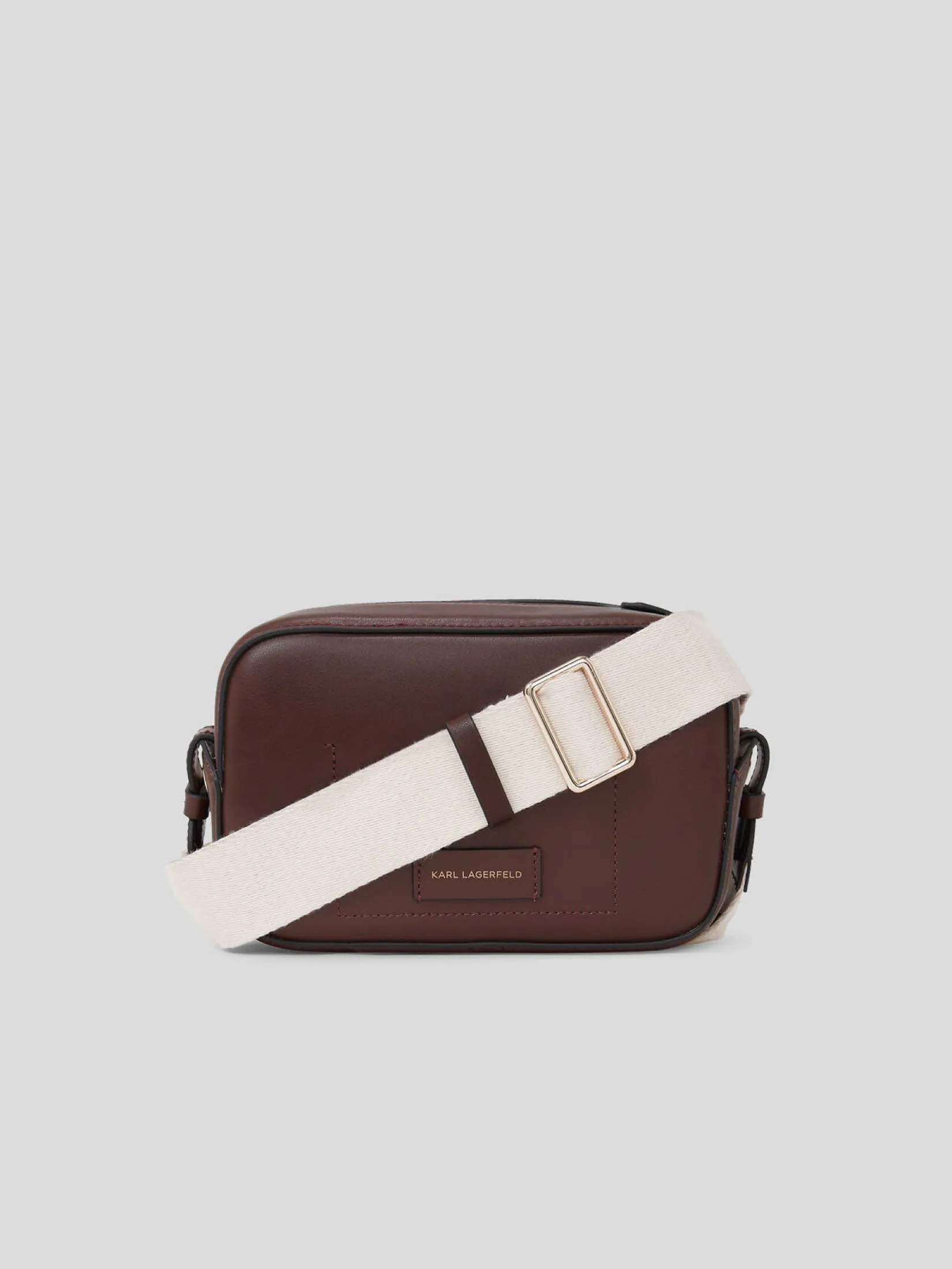 K/CIRCLE PERFORATED CROSSBODY BAG